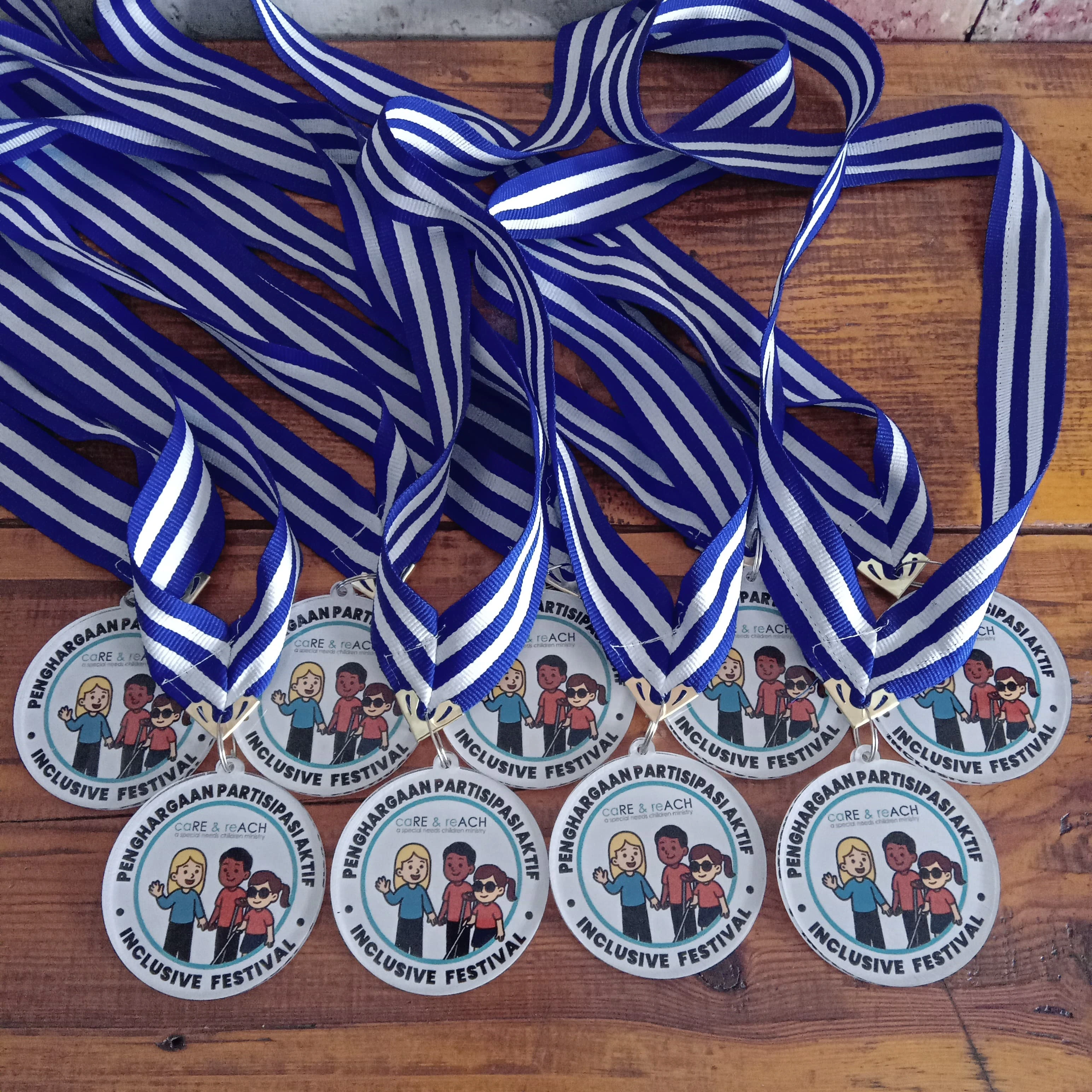 Care And Reach Acrylic Medal